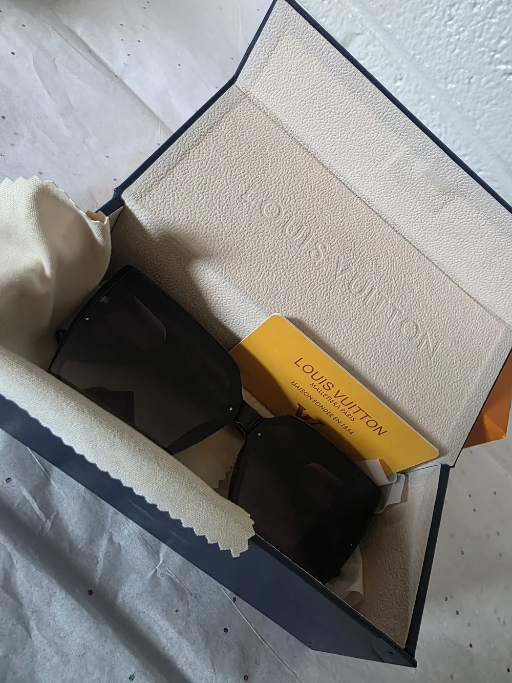 Black Sunglasses with Red-Tint Lenses